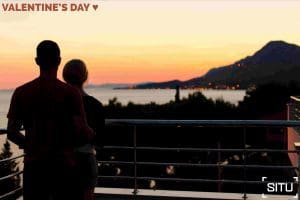 couple watching magnificent sunset and sea views from their serviced apartment