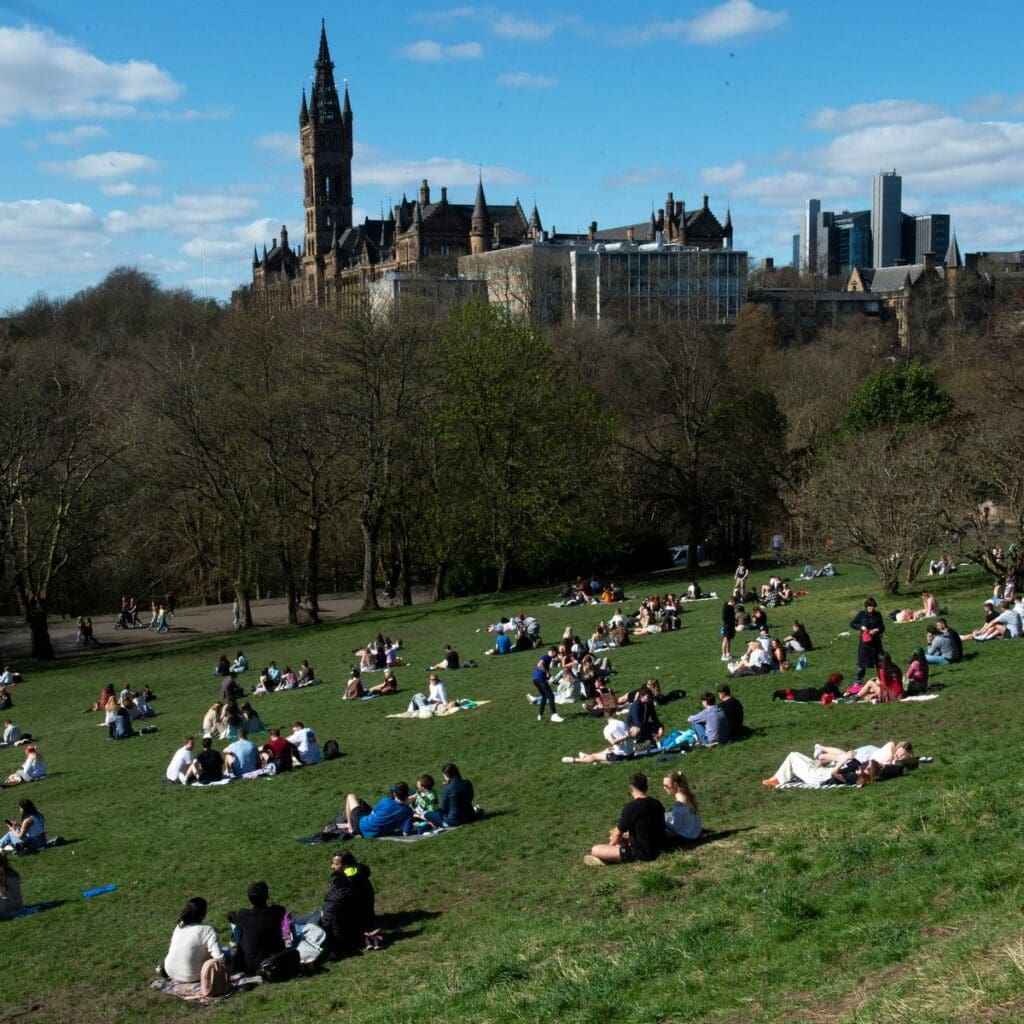 Friends and family meeting at Kelvingrove Park in Glasgow.