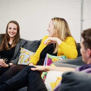 The team talk happily at work