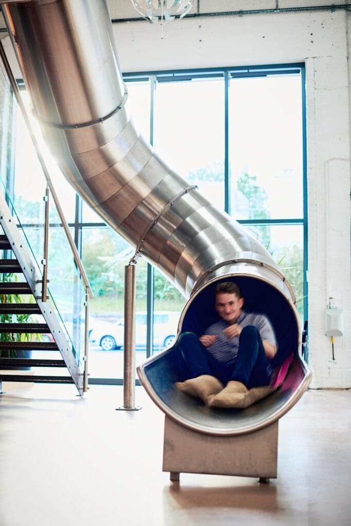 Our SEO, Matt - expert enjoying going down the slide at Situ. This is how to keeping employees happy!