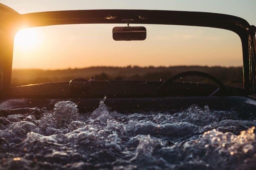 One of Situ's available quirky serviced accommodations in the UK. Hot tub built in an old car.