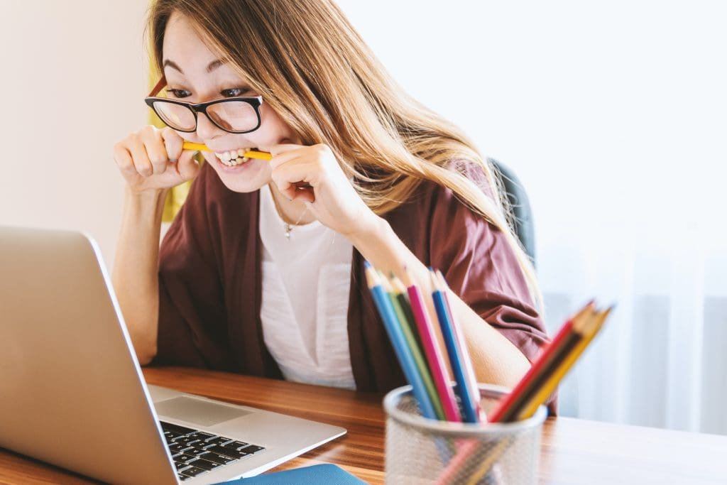 Girl stressed at work - Stress Awareness Month