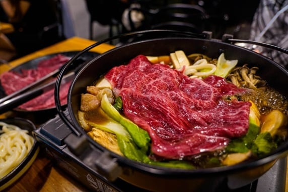 Sukiyaki cooking in a restaurant.