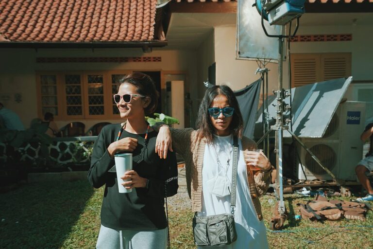 two girls at filming set - production companies