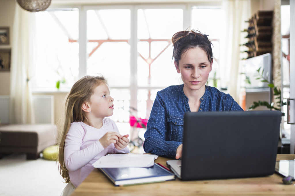 mother and daughter working