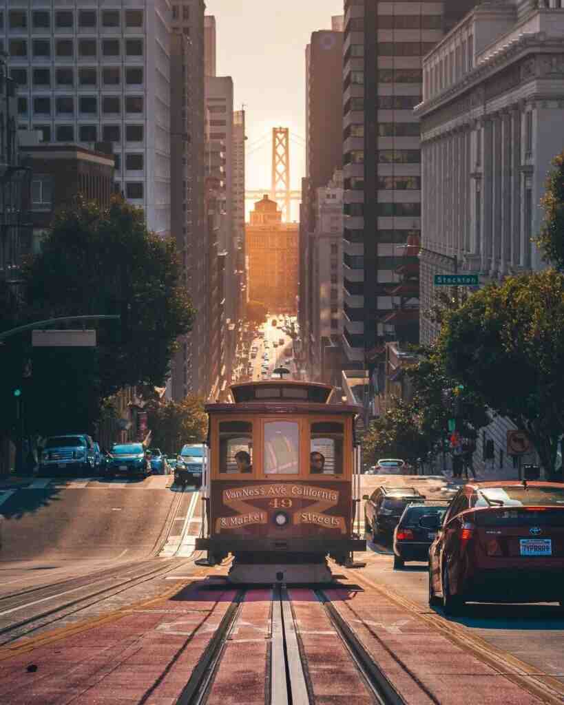 cable car and city view of San Francisco