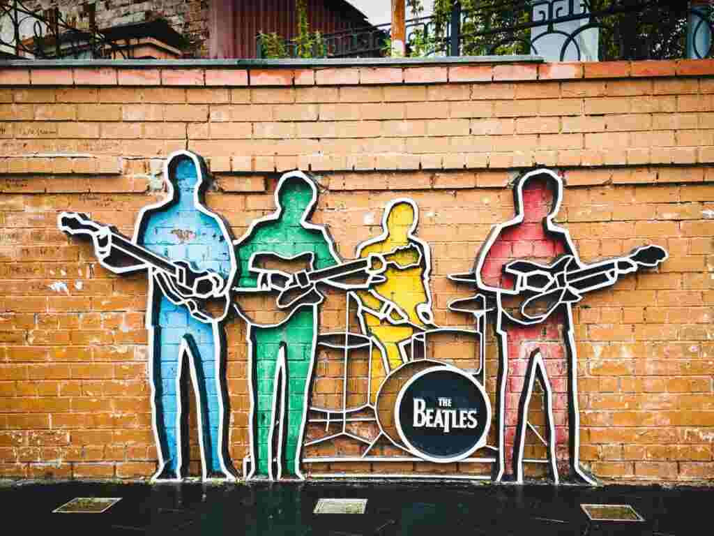The Beatles band image on wall