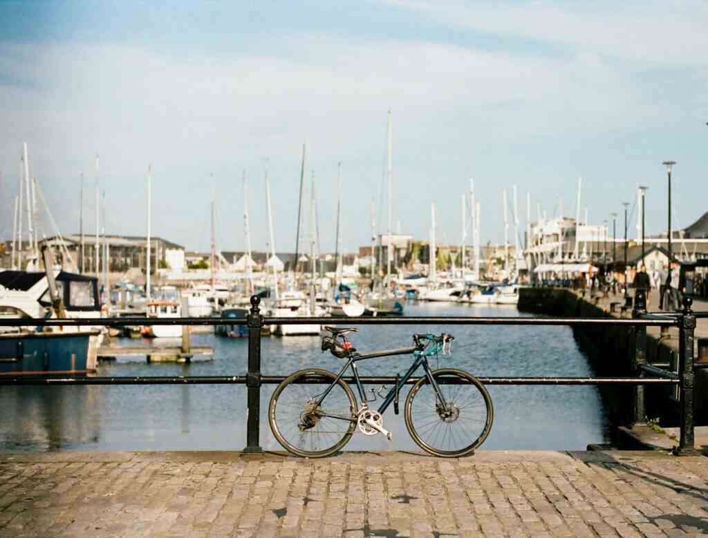 Bike, yachts at the harbour front of Plymouth