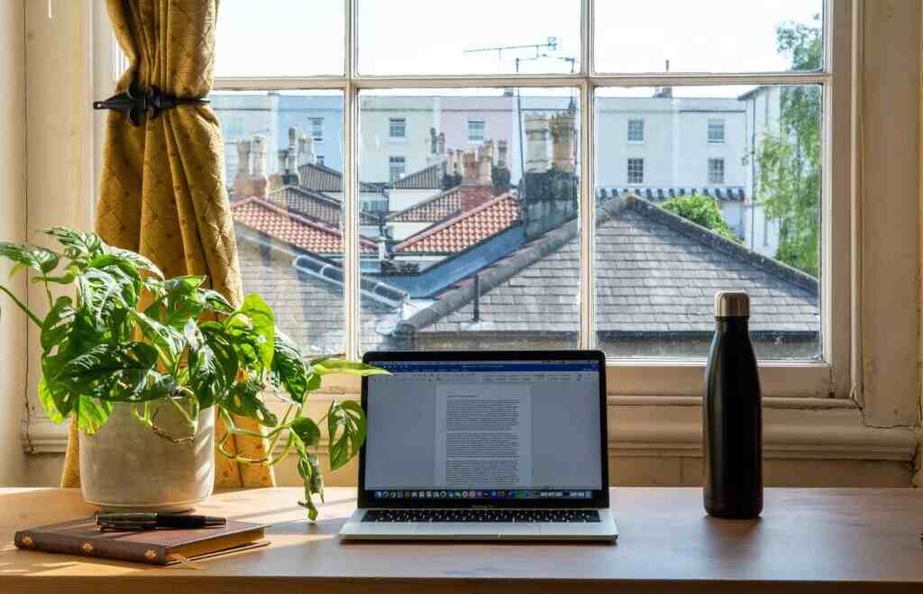working desk and laptop in a serviced apartment