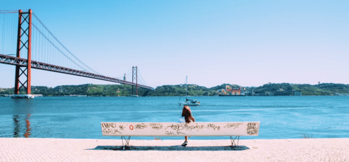 Women sitting on a bench in Lisbon