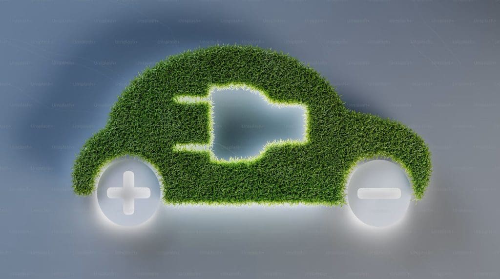 A green car made out of grass