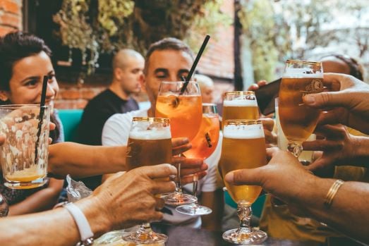 People drinking in a pub