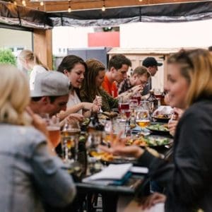 People sitting around a table in a restaurant