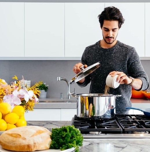 A man cooking in a kitchen