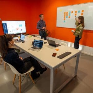 team discussing project in meeting room